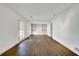 Bright living room with hardwood floors and built-in shelving creates a welcoming atmosphere at 355 Ridgeview Trl, Atlanta, GA 30328