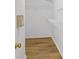 A walk-in closet with wood floors and wire shelving for ample storage at 1471 Adair Hill Ct, Dacula, GA 30019