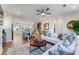 Open-concept living area showcasing hardwood floors and seamless transition to the modern kitchen and dining area at 1737 Lansmere Sw St, Marietta, GA 30008