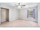 Bedroom with a closet and a window with natural light at 939 Mill Creek Ave, Canton, GA 30115