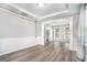 Open dining room area with natural light and hardwood flooring, perfect for entertaining at 939 Mill Creek Ave, Canton, GA 30115