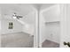 Bright bedroom with plush carpeting plus a walk-in closet for storage at 1655 Pine Ridge Cir, Woodstock, GA 30188