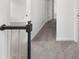 Upstairs hallway featuring carpeted floor and white walls at 1655 Pine Ridge Cir, Woodstock, GA 30188