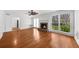 Spacious living room with fireplace, built-ins, and access to outdoor views at 1655 Pine Ridge Cir, Woodstock, GA 30188