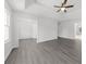 Main bedroom with tray ceilings and access to en-suite bath at 1655 Pine Ridge Cir, Woodstock, GA 30188
