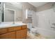 Bathroom vanity, toilet, tub and shower combination at 3272 Tiara Sw Cir, Atlanta, GA 30311