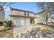 This lovely home includes a two-car garage and tan siding in a well-maintained neighborhood at 3272 Tiara Sw Cir, Atlanta, GA 30311