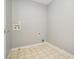 Laundry room with tile flooring and utility connections at 3272 Tiara Sw Cir, Atlanta, GA 30311