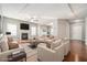 Spacious living room featuring a fireplace, hardwood floors, and neutral color scheme at 3272 Tiara Sw Cir, Atlanta, GA 30311