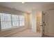Bright bedroom with large window and walk-in closet at 5447 Blossomwood Sw Trl, Mableton, GA 30126