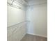 Walk-in closet featuring wire shelving for organization and storage at 5447 Blossomwood Sw Trl, Mableton, GA 30126