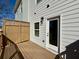 Outdoor deck with wood privacy fence and exterior door at 5447 Blossomwood Sw Trl, Mableton, GA 30126
