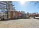Another view of the large backyard featuring a carport and back of the house at 3035 Mclendon Nw Cir, Atlanta, GA 30318
