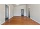 Spacious living room featuring hardwood floors, neutral walls, and ample space for relaxation and entertainment at 3035 Mclendon Nw Cir, Atlanta, GA 30318