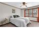 Bedroom with a double window and a ceiling fan at 322 Foxfire Sw Dr, Smyrna, GA 30082