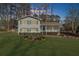 Exterior of a two-story home with a well-manicured lawn at dusk at 322 Foxfire Sw Dr, Smyrna, GA 30082