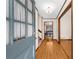 Inviting foyer featuring hardwood floors, staircase, and natural light at 322 Foxfire Sw Dr, Smyrna, GA 30082