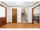 Bright foyer with hardwood floors and staircase at 322 Foxfire Sw Dr, Smyrna, GA 30082