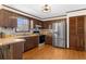 Kitchen featuring stainless steel appliances, breakfast bar, and wooden cabinets at 322 Foxfire Sw Dr, Smyrna, GA 30082