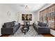 Comfortable living room with modern sofas and a stylish rug at 322 Foxfire Sw Dr, Smyrna, GA 30082