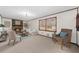 Living room boasting a cozy fireplace, neutral décor, and ample natural light at 322 Foxfire Sw Dr, Smyrna, GA 30082