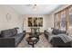 Comfortable living room with modern sofas, side tables and a stylish rug at 322 Foxfire Sw Dr, Smyrna, GA 30082