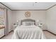 Comfortable main bedroom featuring a ceiling fan and neutral-colored walls at 322 Foxfire Sw Dr, Smyrna, GA 30082
