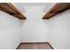 Empty walk-in closet with hanging shelves at 322 Foxfire Sw Dr, Smyrna, GA 30082