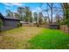 View of backyard featuring a lawn, privacy fence and storage shed at 3280 Hazelwood Sw Dr, Atlanta, GA 30311