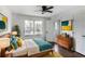 Well-decorated bedroom with natural light, hardwood floors, and modern furnishings at 3280 Hazelwood Sw Dr, Atlanta, GA 30311