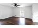 Bedroom offers great natural light, hardwood floors, a ceiling fan, and neutral paint at 3280 Hazelwood Sw Dr, Atlanta, GA 30311