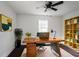 Bright home office featuring a desk, hardwood floors and a window at 3280 Hazelwood Sw Dr, Atlanta, GA 30311