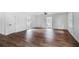 Spacious living room featuring hardwood floors, neutral walls, and natural lighting at 3280 Hazelwood Sw Dr, Atlanta, GA 30311