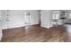 Spacious living room featuring luxury vinyl plank flooring and abundant natural light at 3280 Hazelwood Sw Dr, Atlanta, GA 30311