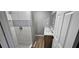 A full bathroom featuring tiled shower and vanity with double sinks and modern fixtures at 3814 Rex Rd, Rex, GA 30273