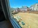 View of a fenced back yard with a stone patio and space for outdoor activities at 5066 Healey Dr, Smyrna, GA 30082