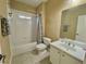 Neutral bathroom with a combined shower and tub, toilet, and a vanity with a sink and mirror at 5066 Healey Dr, Smyrna, GA 30082