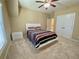 Cozy bedroom with carpet flooring, ceiling fan and double-door closet at 5066 Healey Dr, Smyrna, GA 30082