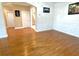 Elegant dining room with hardwood floors and wainscoting, providing a sophisticated space for Gathering meals and gatherings at 5066 Healey Dr, Smyrna, GA 30082