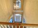 View of the foyer from the second story featuring a large window and modern lighting at 5066 Healey Dr, Smyrna, GA 30082