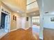Spacious foyer with hardwood floors and views of the living area, creating a welcoming entry with plenty of natural light at 5066 Healey Dr, Smyrna, GA 30082