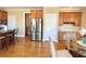 Eat-in kitchen featuring granite countertops, stainless appliances, and custom built-in desk at 5066 Healey Dr, Smyrna, GA 30082