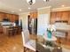 Eat-in kitchen featuring granite countertops, stainless appliances, and custom built-in desk at 5066 Healey Dr, Smyrna, GA 30082