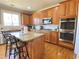 Spacious kitchen featuring stainless steel appliances, granite countertops and hardwood floors at 5066 Healey Dr, Smyrna, GA 30082