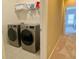 Laundry room features stainless steel washer and dryer set at 5066 Healey Dr, Smyrna, GA 30082