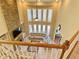 Open living area with a stone fireplace and large windows, creating a bright and inviting space for relaxation and entertainment at 5066 Healey Dr, Smyrna, GA 30082