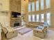 Inviting living room featuring a stone fireplace, built-in shelves, and a plush sectional sofa for relaxing at 5066 Healey Dr, Smyrna, GA 30082
