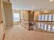Open floorplan showing a living room with a stone fireplace and large windows for natural light at 5066 Healey Dr, Smyrna, GA 30082
