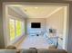 Cozy sitting room with a large window for natural light and a modern entertainment setup at 5066 Healey Dr, Smyrna, GA 30082