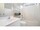 Traditional bathroom with white tile, tub-shower combination, and vanity at 1032 Lena Nw St, Atlanta, GA 30314
